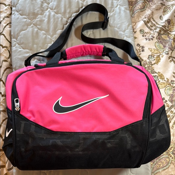 Nike Handbags - Nike Fuchsia and Black Sports Bag